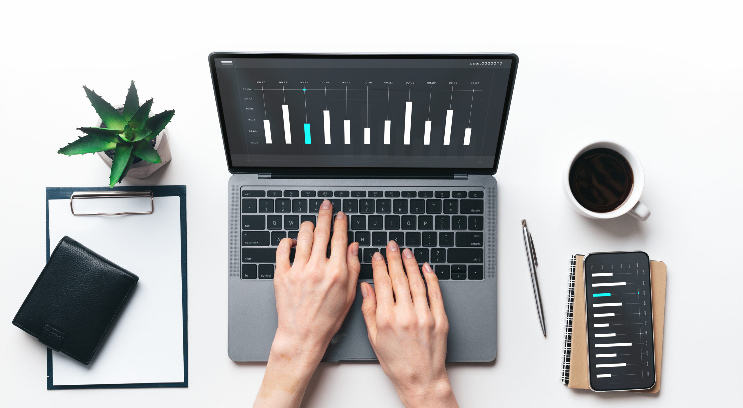 A lawyer working on a legal software dashboard displayed on a laptop, with a mobile version of the same dashboard shown on a smartphone beside it.
